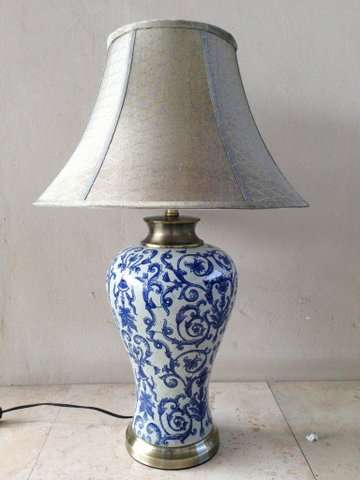 Blue ceramic lamp with beige lampshade