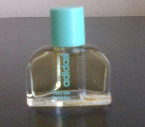 Hard to find vintage Adidas Woman EDT mini perfume bottle- full
