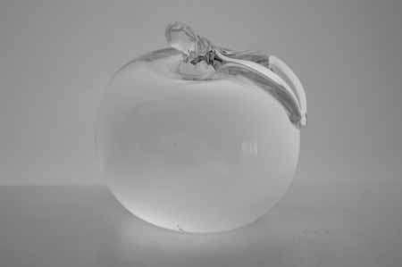 * SIMON PEARCE (IRISH-AMERICAN) TWO MAGNIFICENT PAPERWEIGHTS OF CLEAR GLASS, THE LARGER ONE SIGNED *