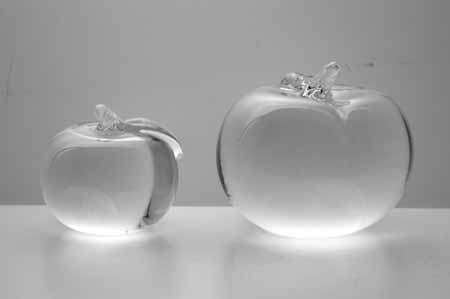 * SIMON PEARCE (IRISH-AMERICAN) TWO MAGNIFICENT PAPERWEIGHTS OF CLEAR GLASS, THE LARGER ONE SIGNED *