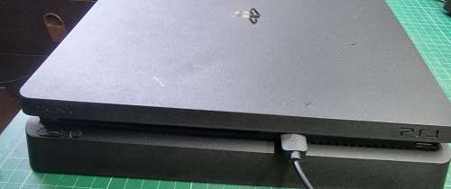PlayStation 4 Slim - 1TB with original controller