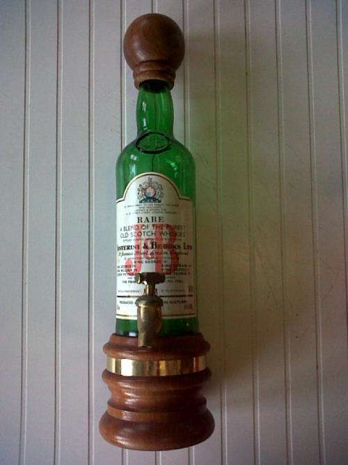 Lovely J&B Whisky Bottle/Decanter with brass tap.
