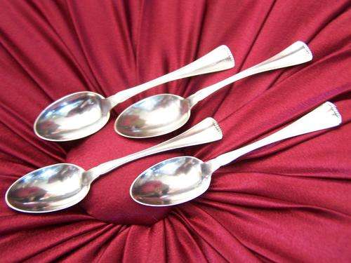 4 Lovely Hallmarked Silver coffee spoons (stamped 800)