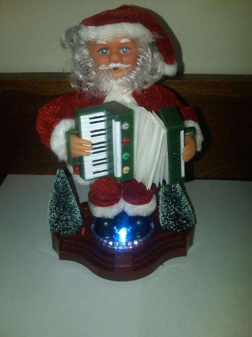 New!! Dancing Christmas Santa Claus with music and red Christmas hat!!