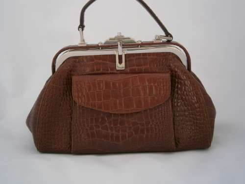 Authentic DISSONA luxury designer quality leather bag.