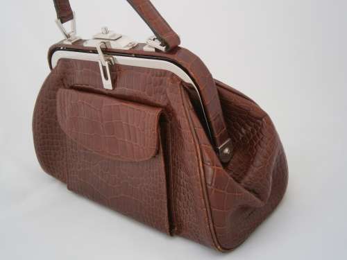 Authentic DISSONA luxury designer quality leather bag.