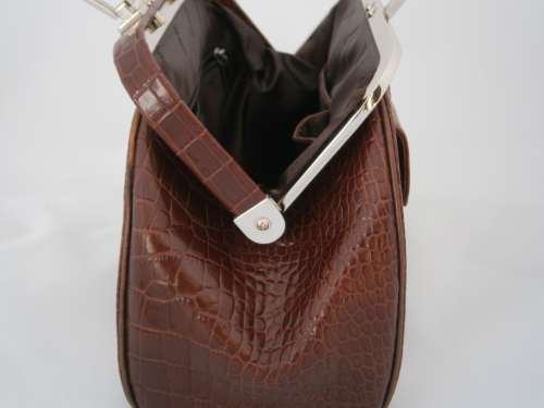 Authentic DISSONA luxury designer quality leather bag.