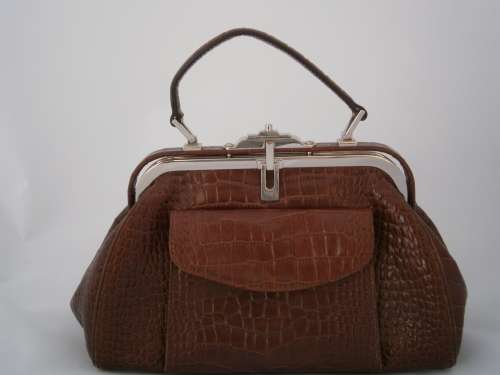 Authentic DISSONA luxury designer quality leather bag.