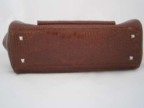 Authentic DISSONA luxury designer quality leather bag.