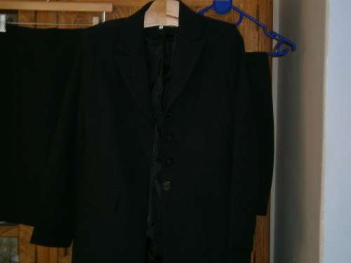 3 pieces Charcoal Suit. New.