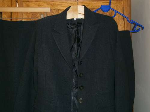 3 pieces Charcoal Suit. New.
