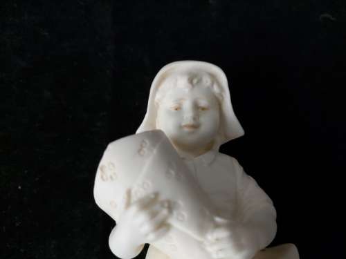 Biscuit porcelain figurine of girl