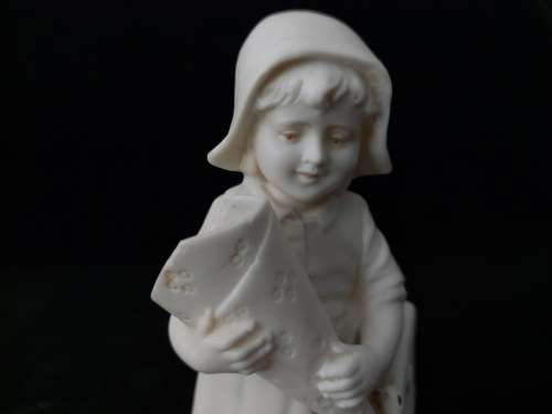 Biscuit porcelain figurine of girl