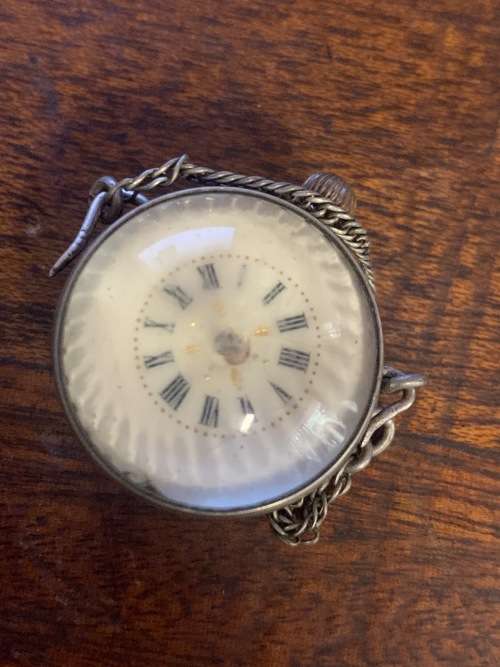 Globe shaped pocket watch
