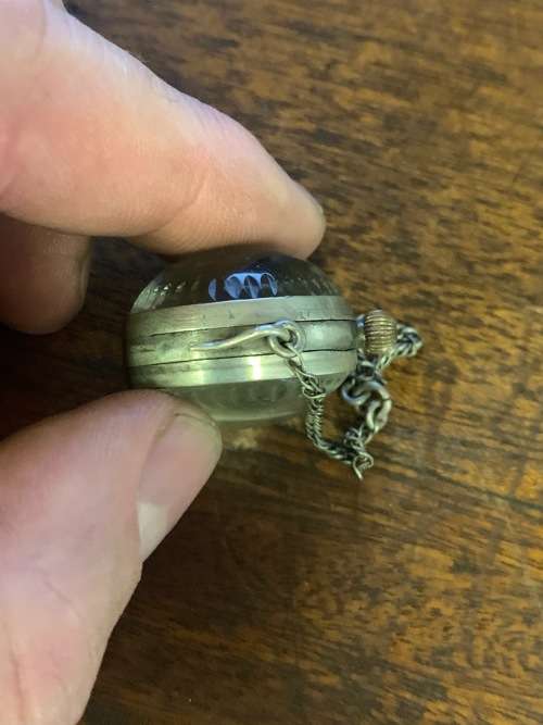 Globe shaped pocket watch