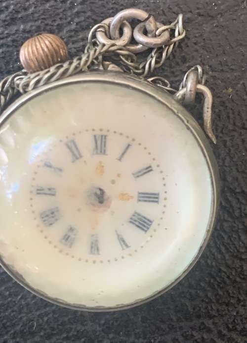Globe shaped pocket watch