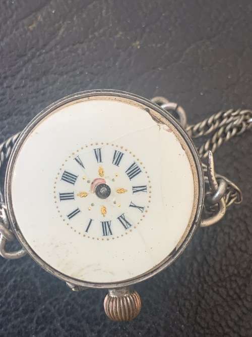 Globe shaped pocket watch