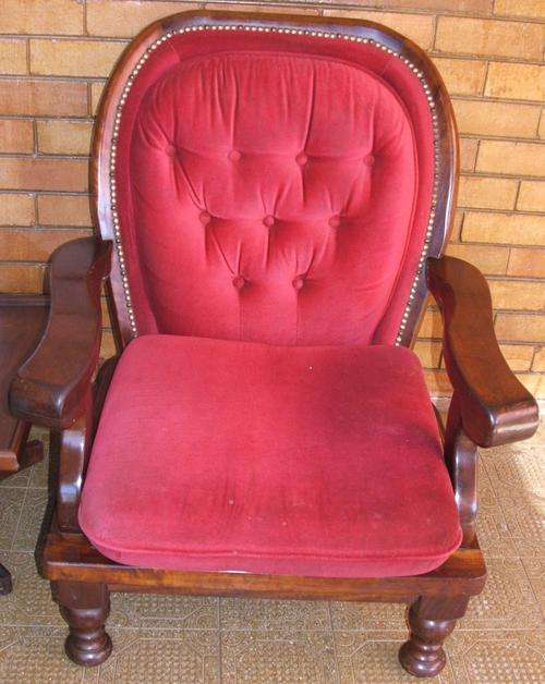 Stunning imbuia chair....need a little TLC (wash)......very low start....