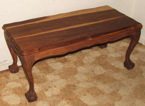 Solid Imbuia coffee table in very good condition...this one is a must have!!
