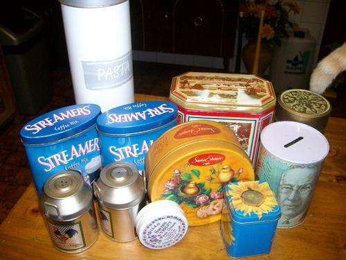 11 Tins of various shapes, sizes and colours