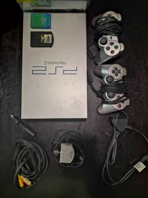 Sony Playstation 2 Silver Edition with games