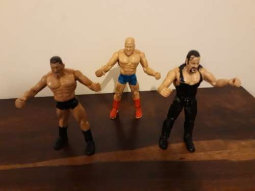 WWE Action Figurines - Undertaker, Batista and Kurt Angle 1 bid for all 3!