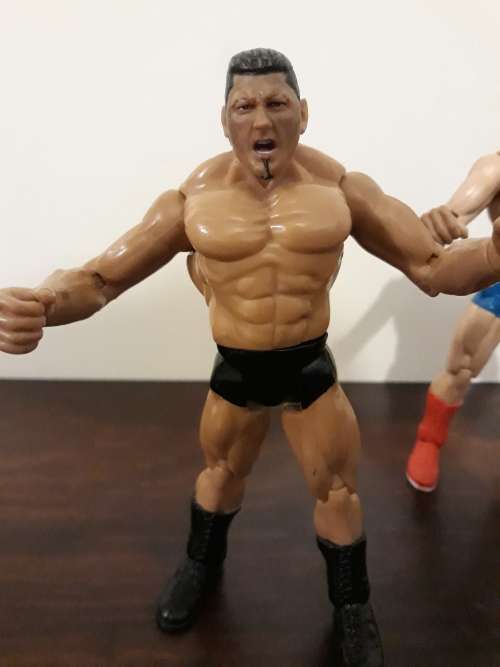 WWE Action Figurines - Undertaker, Batista and Kurt Angle 1 bid for all 3!