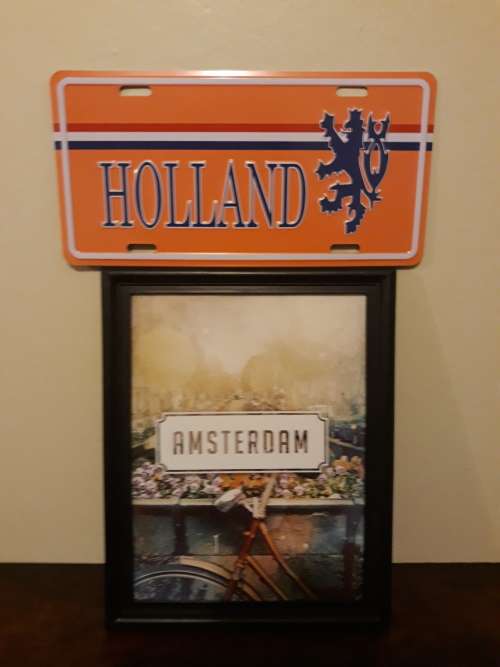 A Holland Plaque (Metal) and an Amsterdam Picture in Frame