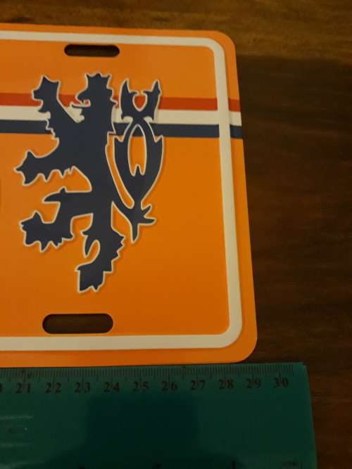 A Holland Plaque (Metal) and an Amsterdam Picture in Frame