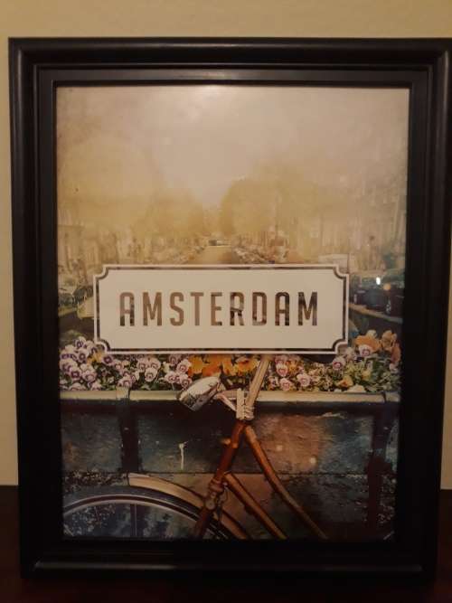 A Holland Plaque (Metal) and an Amsterdam Picture in Frame