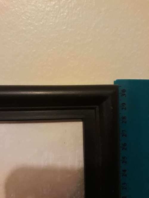 A Holland Plaque (Metal) and an Amsterdam Picture in Frame