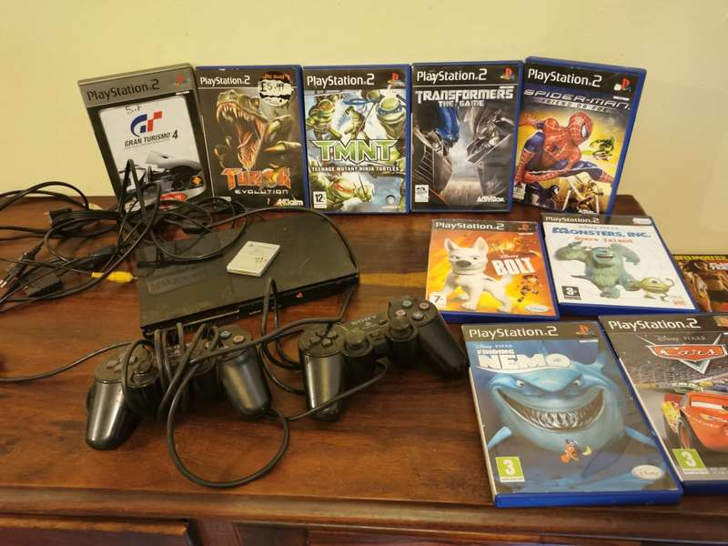 Complete PlayStation 2 Console with Memory Card and 9 Games