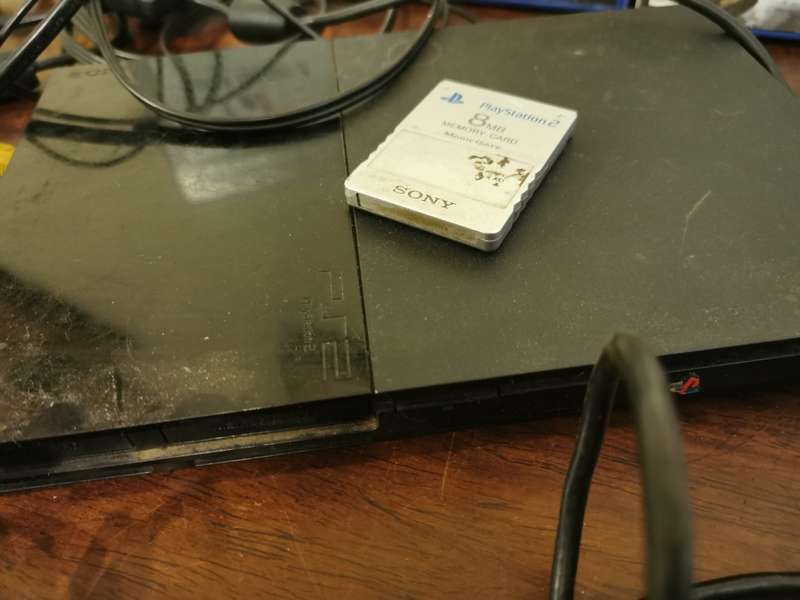 Complete PlayStation 2 Console with Memory Card and 9 Games