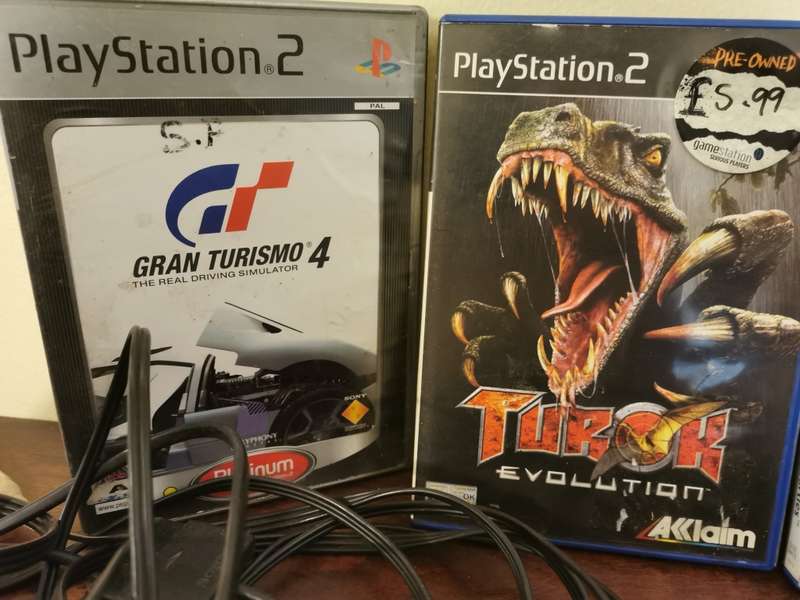 Complete PlayStation 2 Console with Memory Card and 9 Games