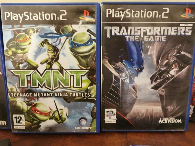 Complete PlayStation 2 Console with Memory Card and 9 Games