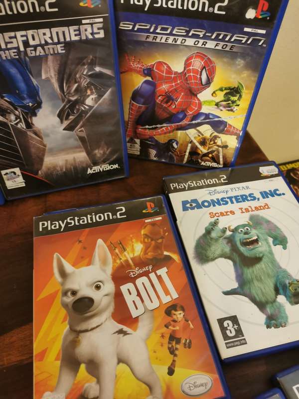 Complete PlayStation 2 Console with Memory Card and 9 Games