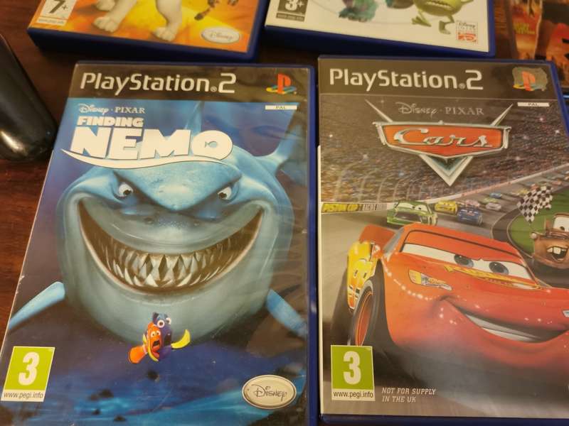Complete PlayStation 2 Console with Memory Card and 9 Games