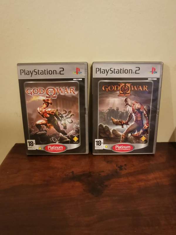 God of War 1 and 2 on PlayStation 2 with Booklets