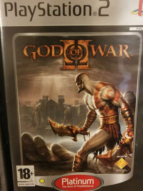 God of War 1 and 2 on PlayStation 2 with Booklets