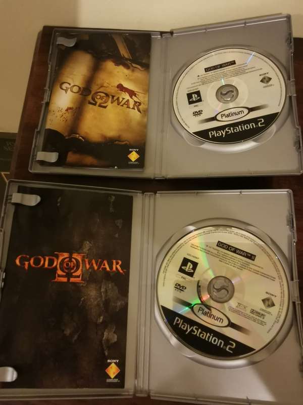 God of War 1 and 2 on PlayStation 2 with Booklets