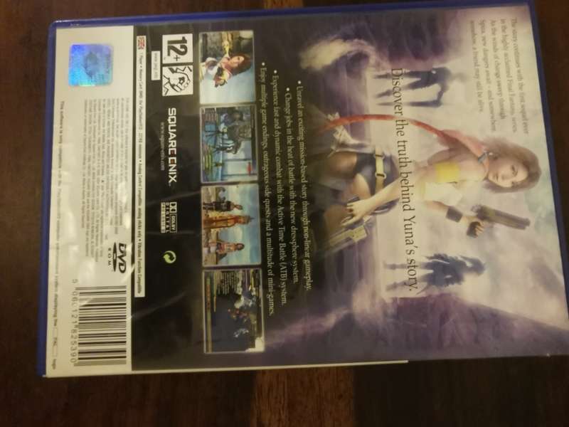 Final Fantasy X-2 on PlayStation 2 with Booklet