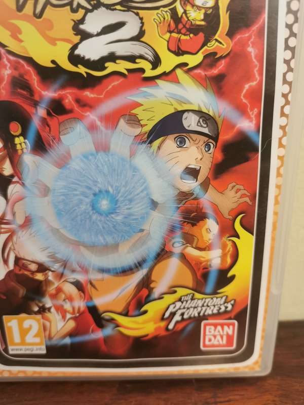 Naruto Ultimate Ninja Heroes 2 on PSP with Booklet