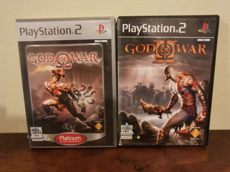 God of War 1 and 2 on PlayStation 2 with Booklets