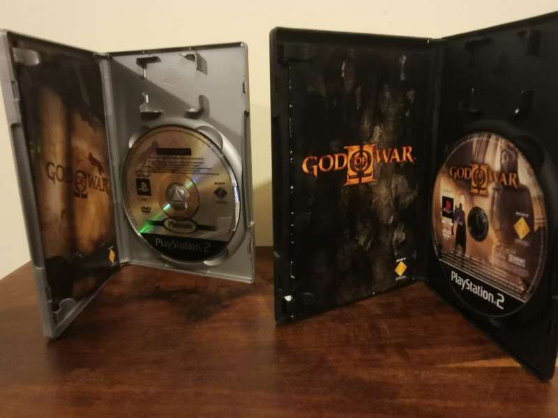 God of War 1 and 2 on PlayStation 2 with Booklets