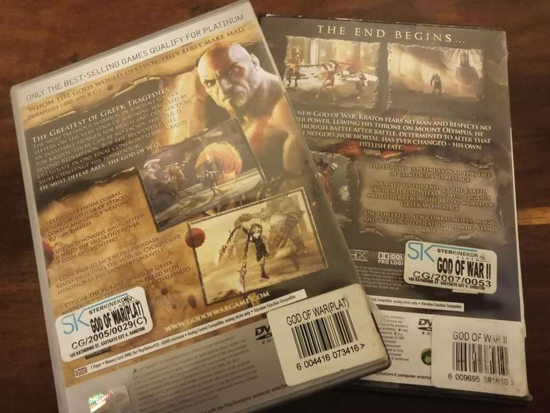 God of War 1 and 2 on PlayStation 2 with Booklets
