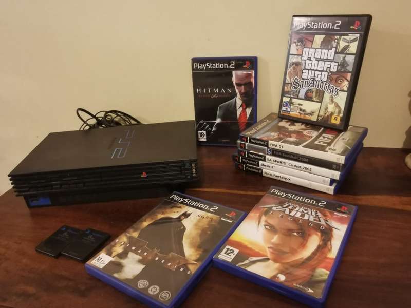 PlayStation 2 Fat Console with 2 Memory Cards and x9 Games