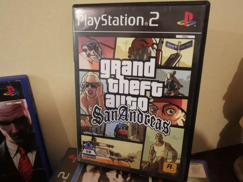 PlayStation 2 Fat Console with 2 Memory Cards and x9 Games