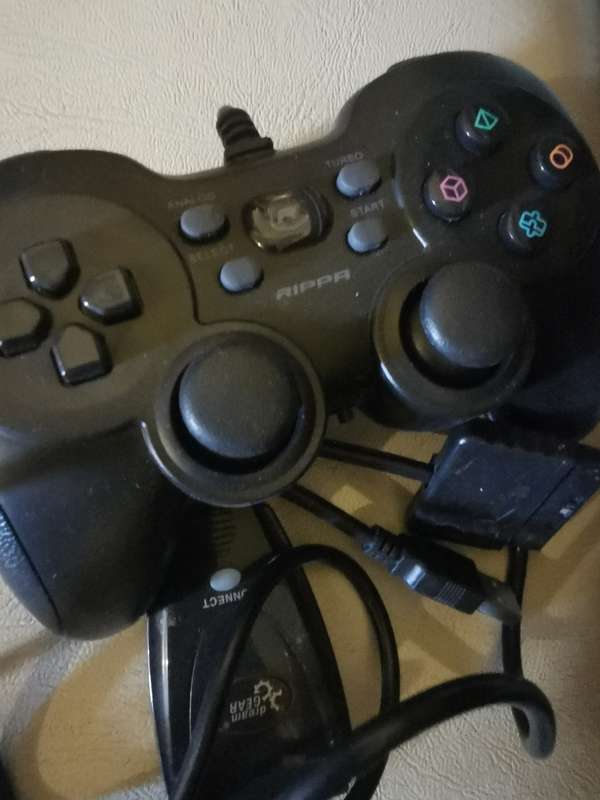 PlayStation 2 Fat Console with 2 Memory Cards and x9 Games