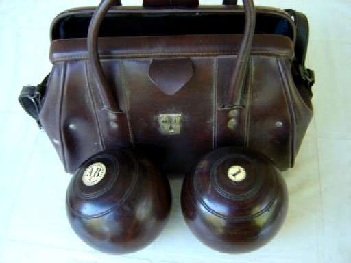 Pair of Vintage Lawn Bowls and bag.