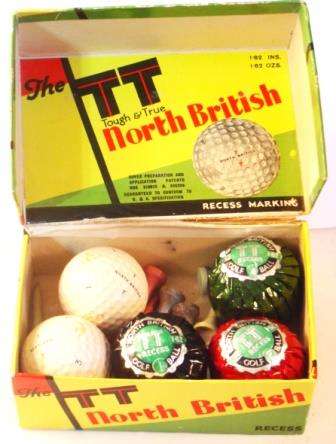 A Vintage Box of North British Golf Balls, containing 5 Balls and some Tees.